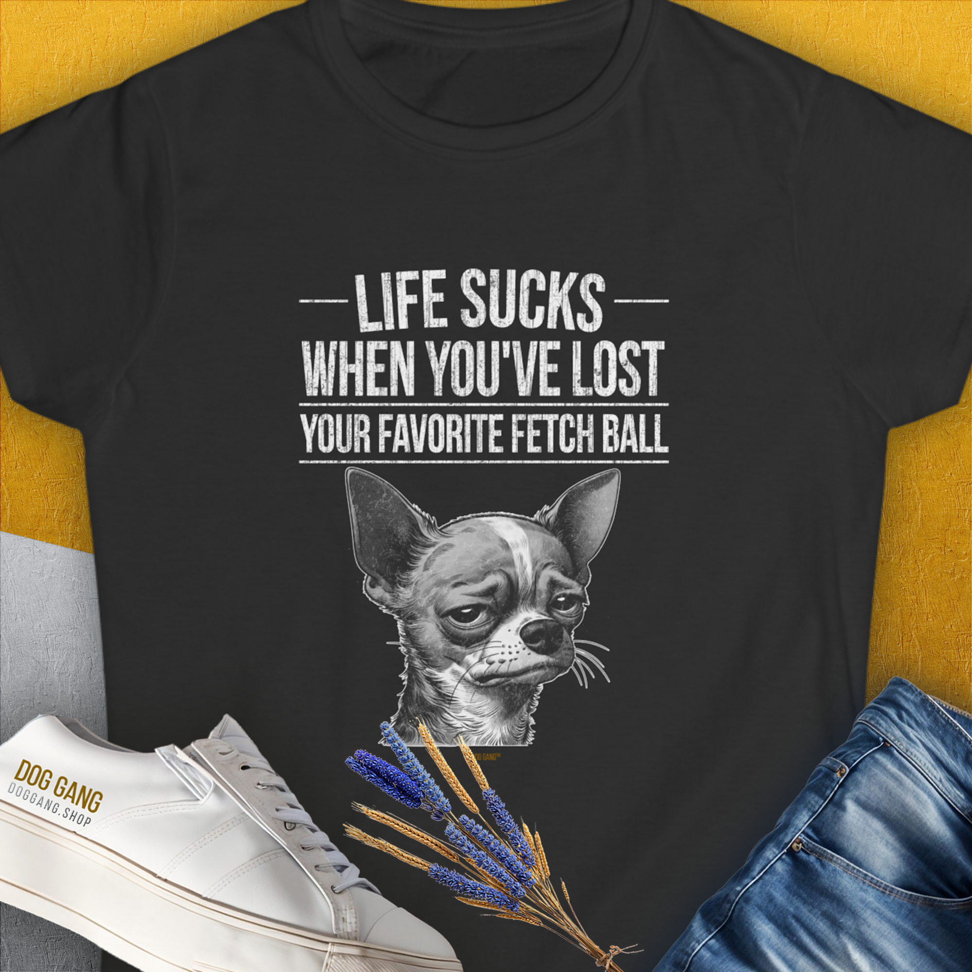 Sad dog (Chihuahua) illustration with "Life Sucks When Youve Lost Your Favorite Fetch Ball", Volume 6 text on a black womens T-shirt. A funny dog shirt for casual comfort. Designed by Dog Gang.