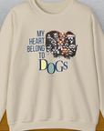 The My Heart Belongs To Dogs, Volume 1 design features charming dog graphics alongside the phrase My heart belongs to dogs. Perfect for any dog lover. Designed by Dog Gang.