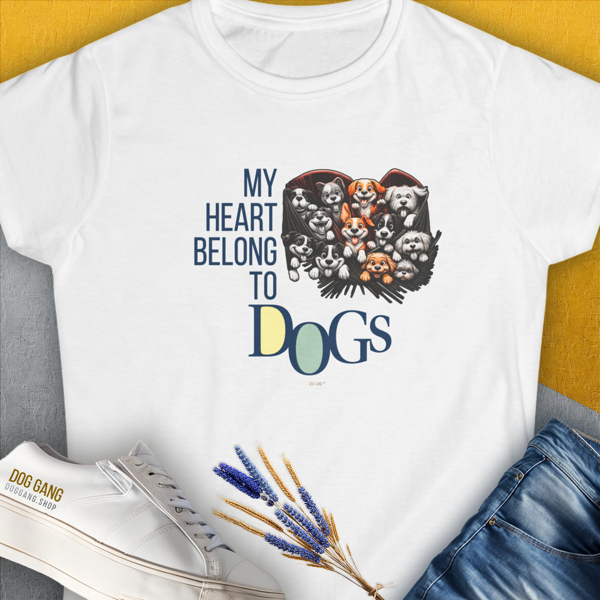 The Womens T-shirt, My Heart Belongs To Dogs, Volume 1, showcases a cute dog design with an adorable illustration and the phrase My Heart Belongs to Dogs. Designed by Dog Gang.