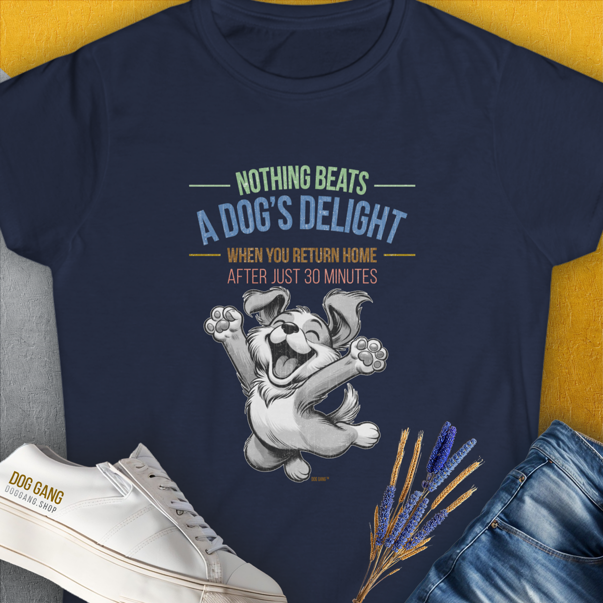 Womens T-Shirt in navy with a joyful dog graphic and the saying Nothing Beats A Dogs Delight When You Return Home, Volume 1. Cute dog design, perfect for any dog lover. Designed by Dog Gang.