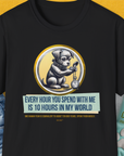 The One Human Year = Ten Dog Years, Volume 1 shirt has a cute dog design with a puppy holding a pocket watch and text about time for dogs. Designed by Dog Gang.