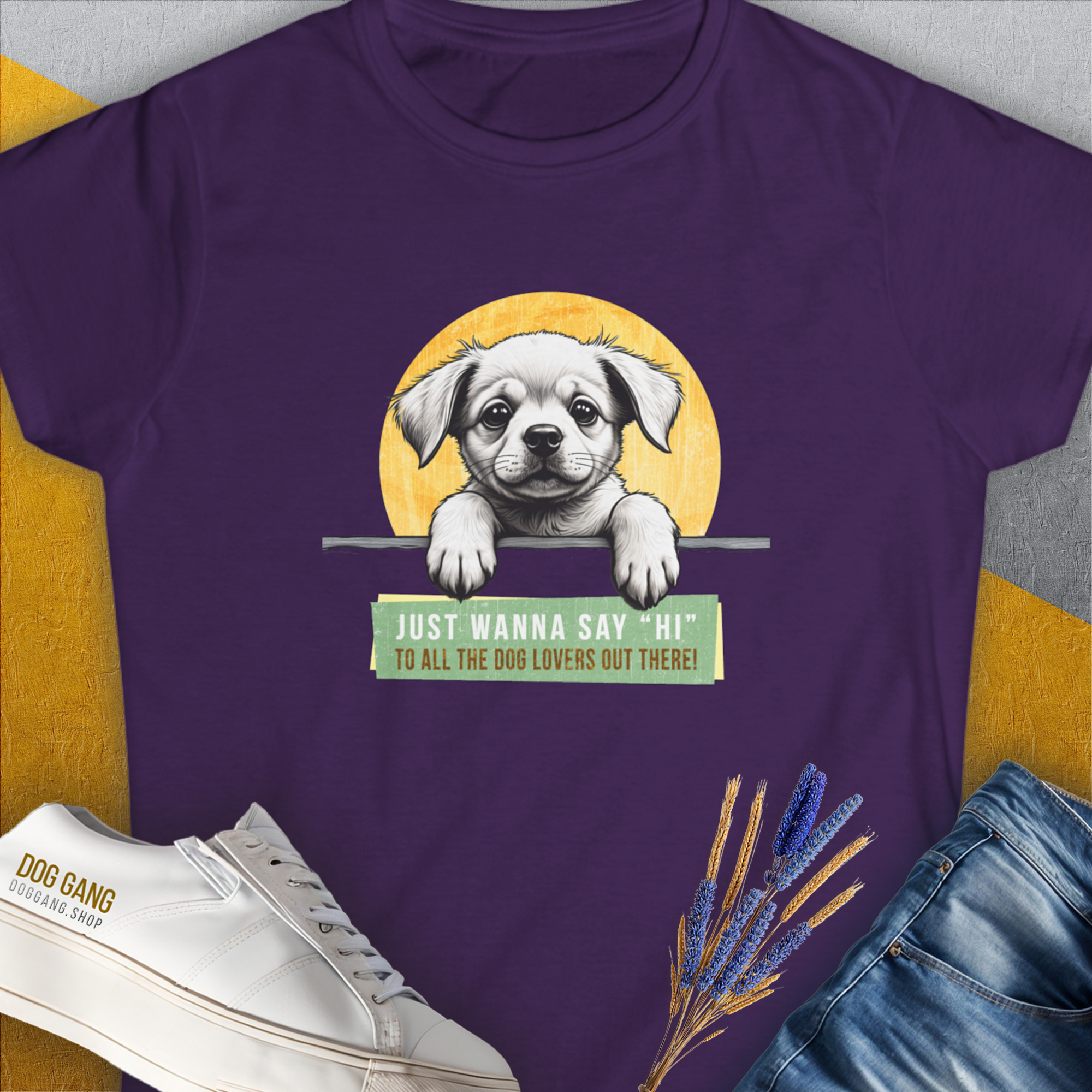 Say Hi Series, Volume 1 Womens T-Shirt highlights a playful puppy with the quote, Just wanna say hi to all the dog lovers out there! Perfect for any dog person. Designed by Dog Gang.