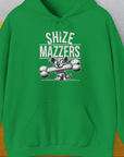 The Shize Mazzers, Volume 1 unisex hoodie showcases a funny dog design in Irish Green. A funny cartoon dog holding an oversized bone in its mouth, preventing it from speaking properly. The text reads "SHIZE MAZZERS". Perfect for any dog ​​lover. Designed by Dog Gang.
