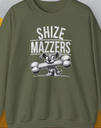 The Shize Mazzers, Volume 1 shirt features a funny cartoon dog holding an oversized bone in its mouth, preventing it from speaking properly. The text reads "SHIZE MAZZERS". Perfect for any dog ​​lover. Designed by Dog Gang.