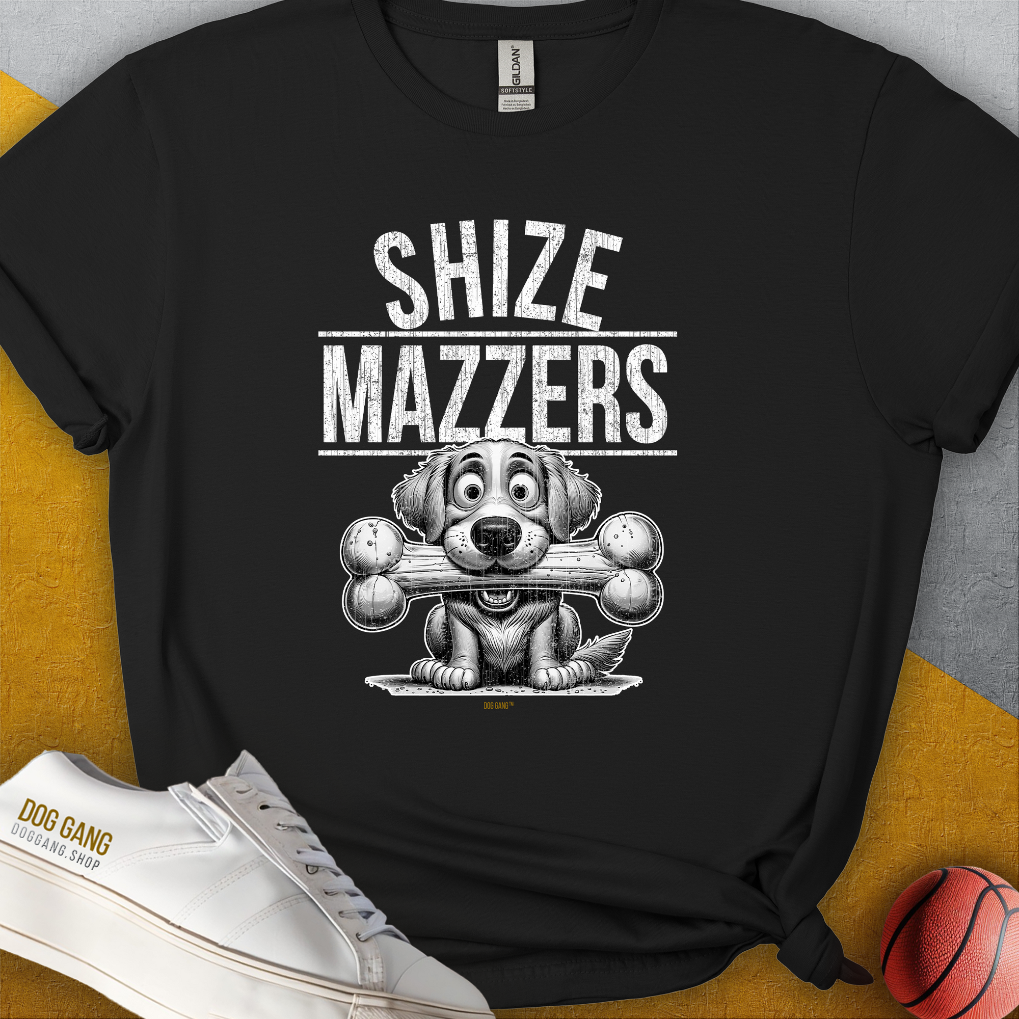 The Shize Mazzers Volume 4 Unisex T-shirt features a funny dog design with SHIZE MAZZERS and a cartoon dog holding a bone in its mouth. Perfect for any dog lover. Designed by Dog Gang.