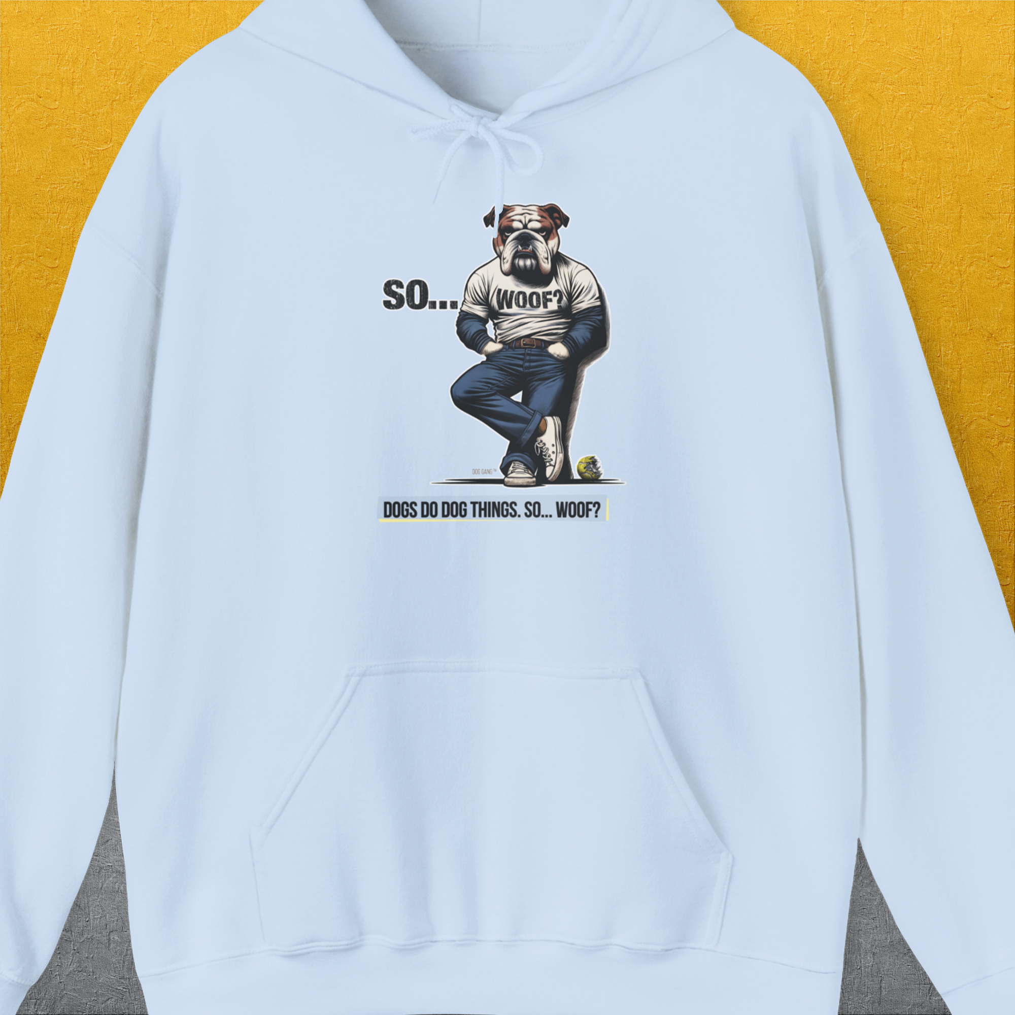 Puppy print tee with a cute bulldog boasting crossed legs and the playful quote SO...WOOF? DOGS DO DOG THINGS. From the legendary &quot;SO...WOOF?&quot;-series. Designed by Dog Gang.