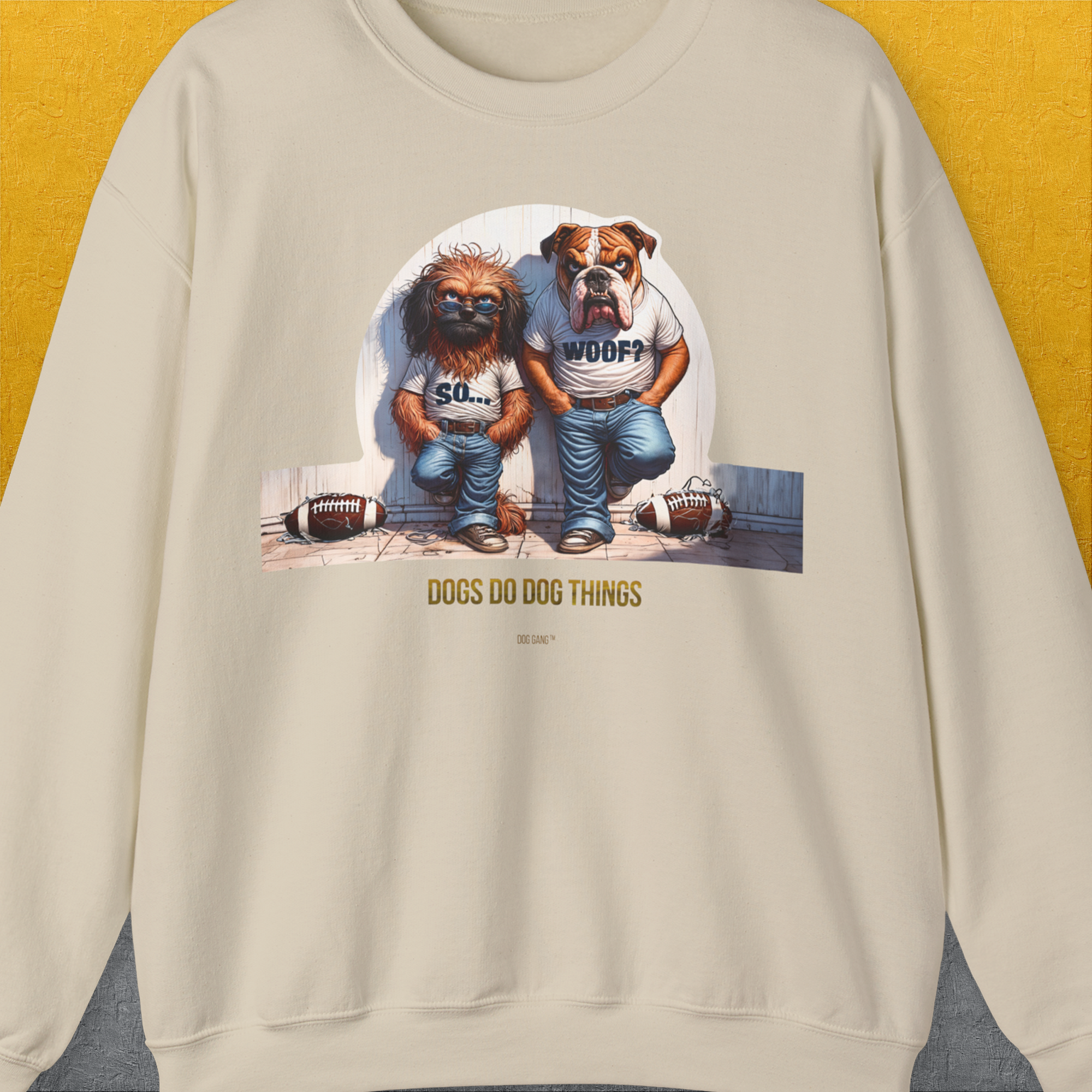 The legendary "So... Woof?"-series Volume 7. Funny Unisex Sweatshirt features a design with two playful dogs in tees and two shredded rugby balls. The sayings "SO... WOOF? and DOGS DO DOG THINGS" add humor. Designed by Dog Gang.