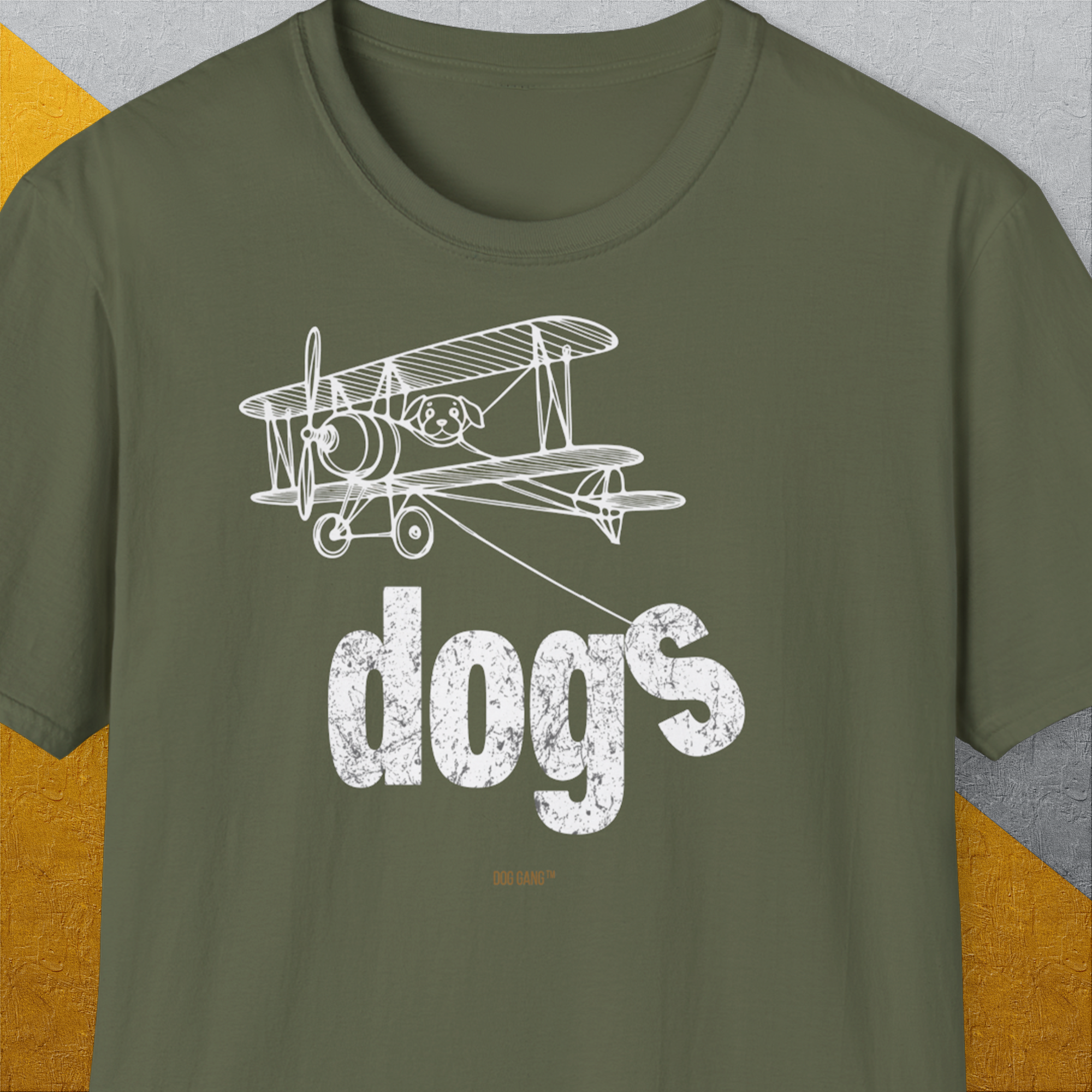 Dog-themed shirt with a vintage biplane flying over the word dogs. Designed by Dog Gang.