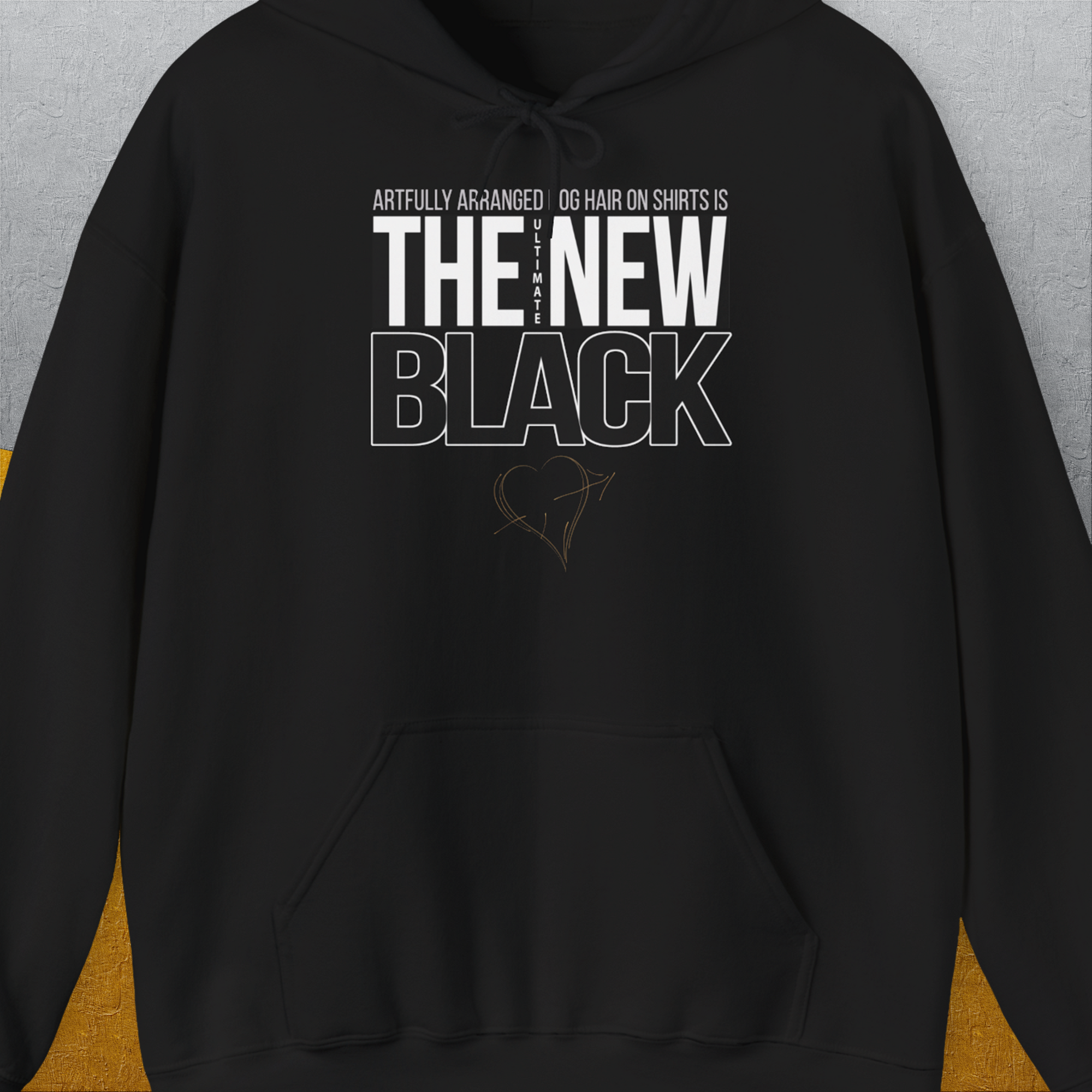 Unisex Hoodie with the quote: Artfully arranged dog hair on shirts is the new black, featuring a heart and paw print. Designed by Dog Gang. Ideal for any dog lover.