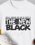 Dog lover gift: The shirt humorously claims, Dog hair on shirts is the new black, featuring a shoe and basketball. Designed by Dog Gang.