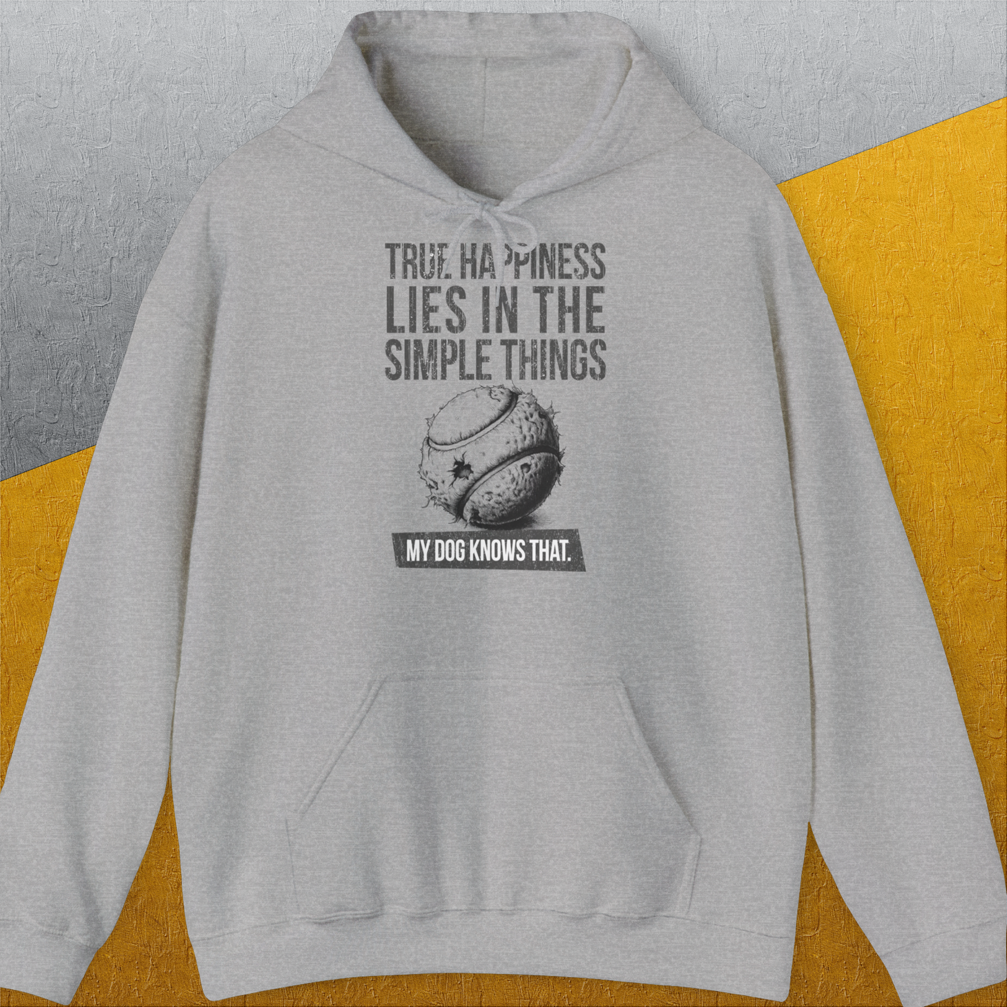 Sport Grey hoodie featuring a tennis ball graphic with the quote: True Happiness Lies in the Simple Things. My Dog Knows That. Perfect for any dog lover. Designed by Dog Gang.