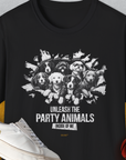 This funny dog shirt features a playful puppy graphic with the text Unleash the Party Animals. Designed by Dog Gang.