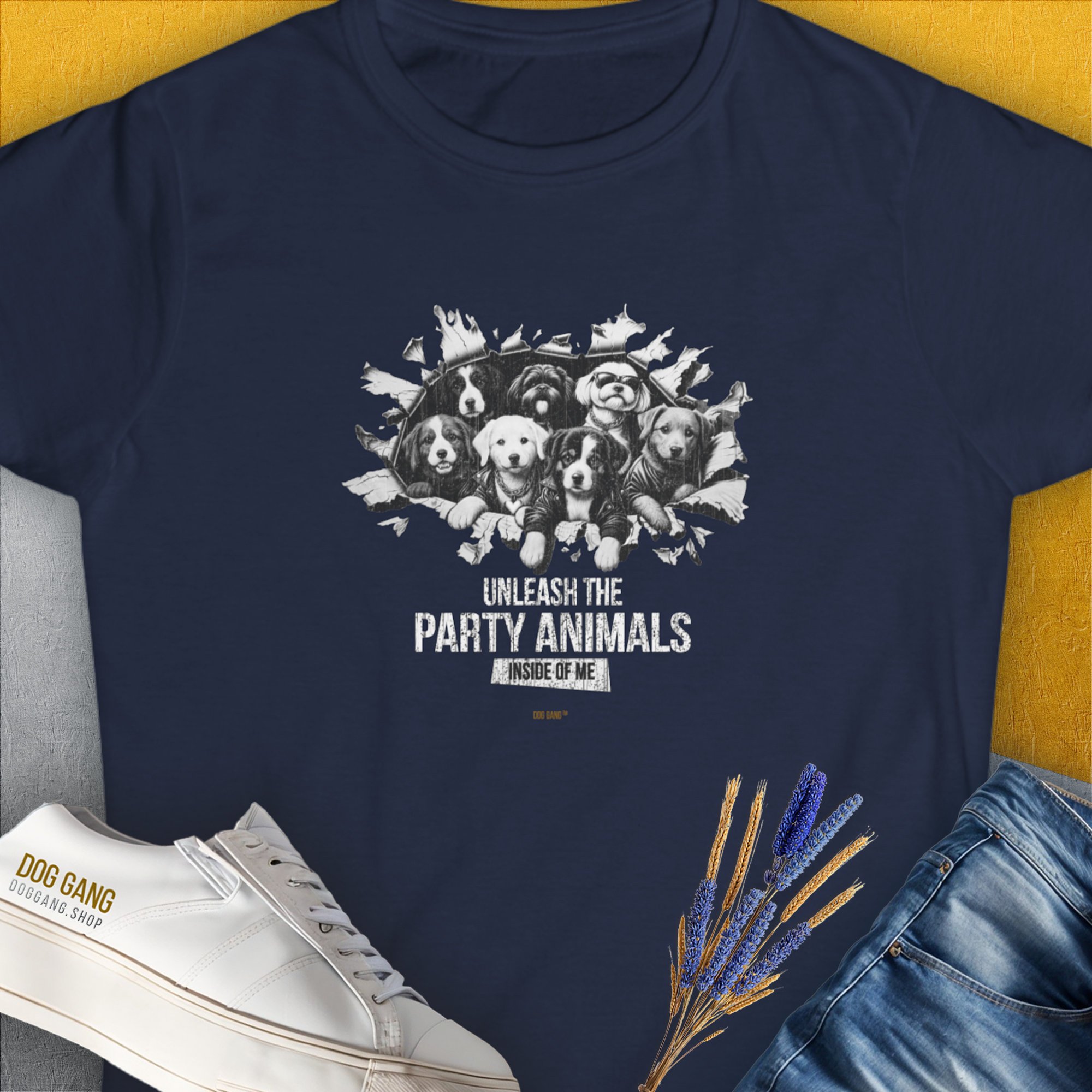 Womens navy T-shirt with playful puppy graphics and the quote Unleash the Party Animals Inside of Me. Perfect for dog lovers. Designed by Dog Gang.