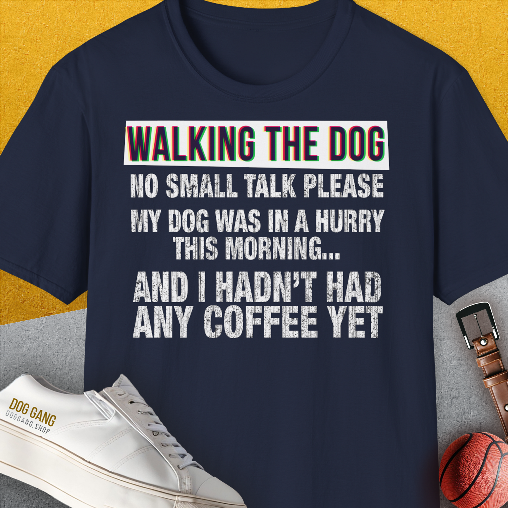 This funny dog shirt showcases the playful quote: WALKING THE DOG... NO SMALL TALK PLEASE... AND I HADNT HAD ANY COFFEE YET on a yellow background. Designed by Dog Gang.